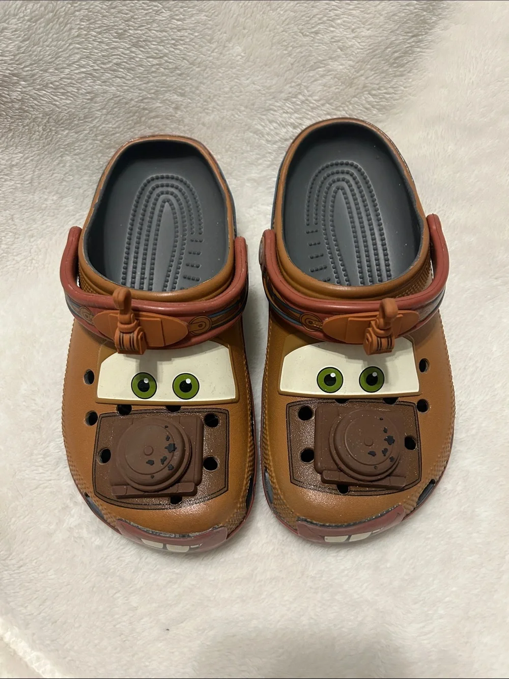 Disney Brown Mater Mens Character Croc Sandals with Green Eye Detail